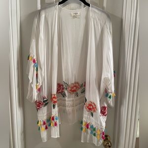 White cotton open jacket with colorful embroidery and trim by Umgee
